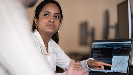 Advanced Therapeutic Technologies student in front of laptop