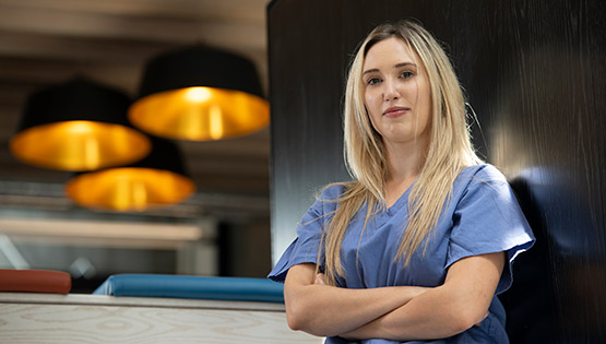 Female RCSI employee in scrubs in ERC Beaumont