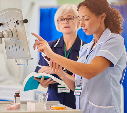 Two nurses conferring.