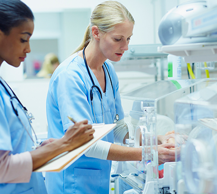 Two nurses at work.