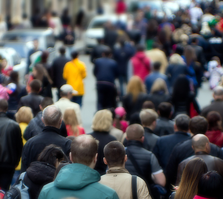 Pedestrians on a busy street.