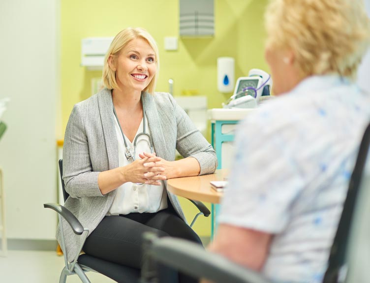 GP talking to patient